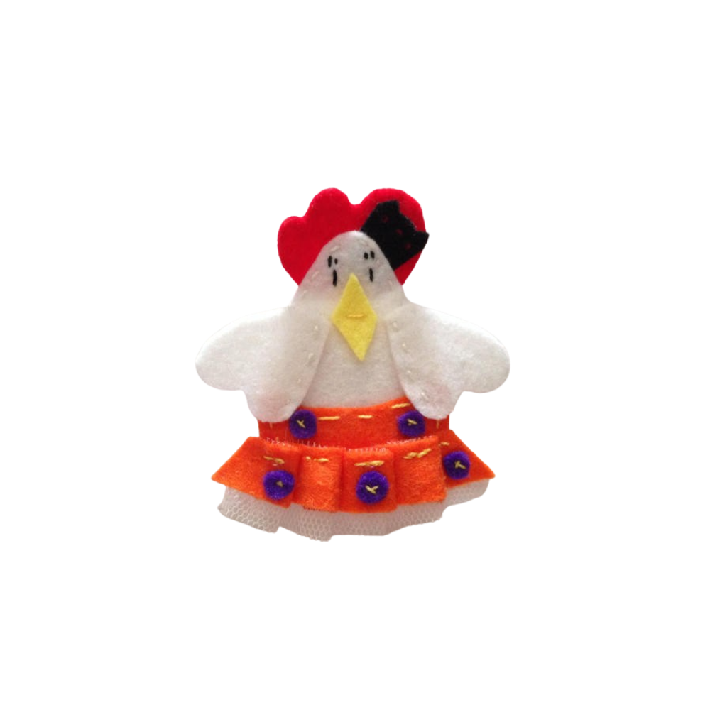 BROCHE POLLITO CON FALDA NARANJA  (8X8,5 CM)