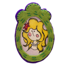 BROCHE OVALADO CON BORDE LILA  (5,5X8,9 CM)